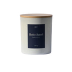 Bougie parfumée Bois chaud JLT 220 g en verre blanc mat avec étiquette bleu nuit